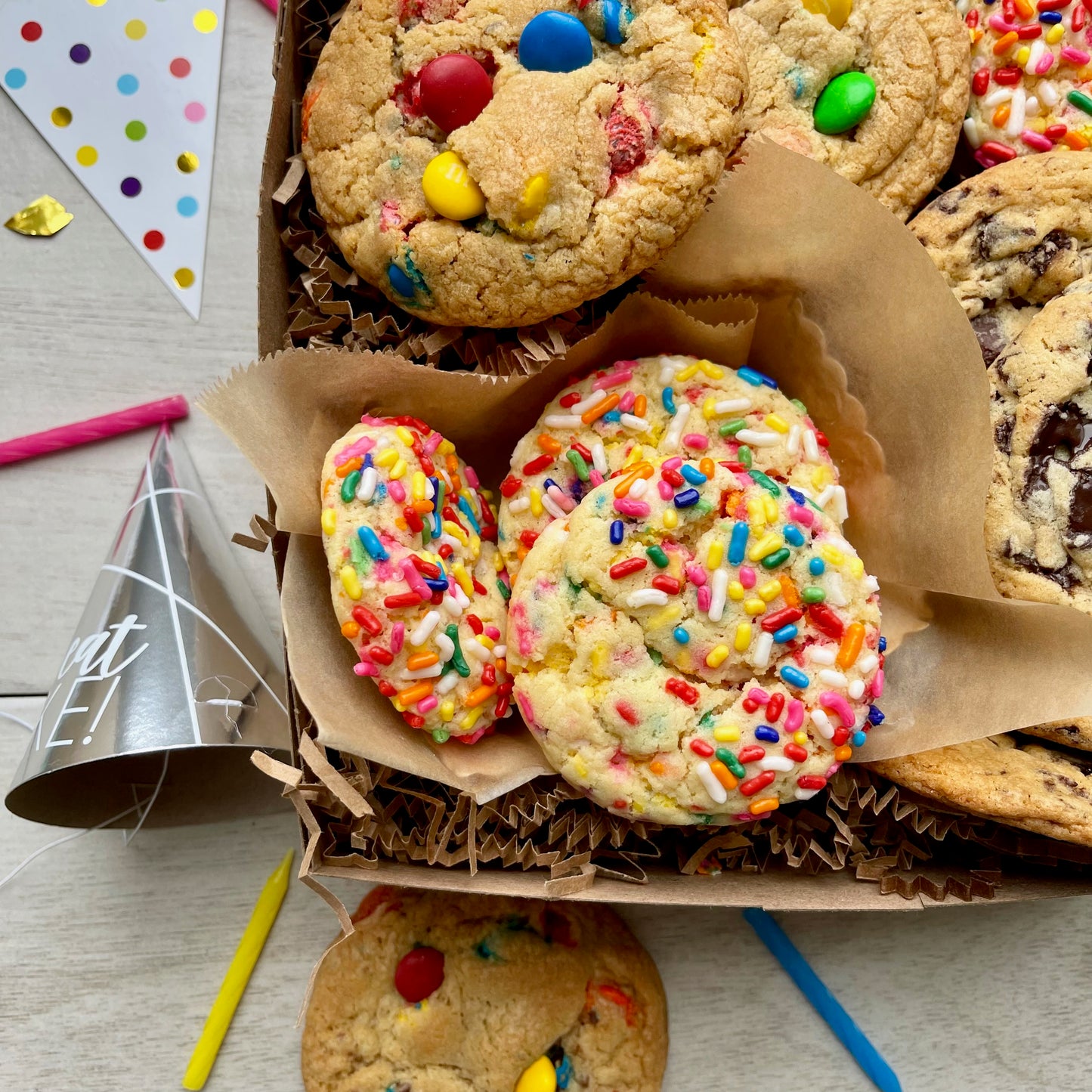 Birthday gift box with sprinkle cookies, m&m cookies, and chocolate chip cookies.