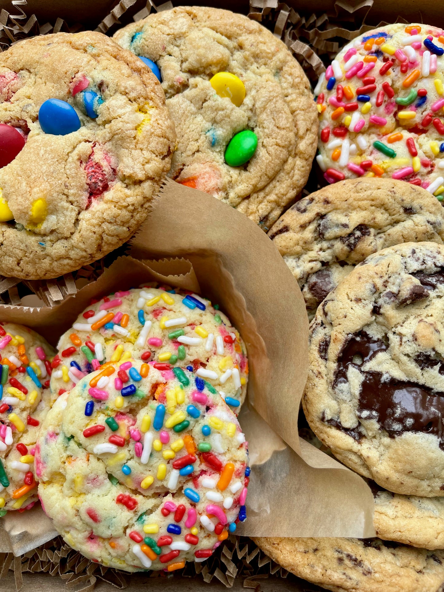 Birthday gift box with sprinkle cookies, m&m cookies, and chocolate chip cookies.