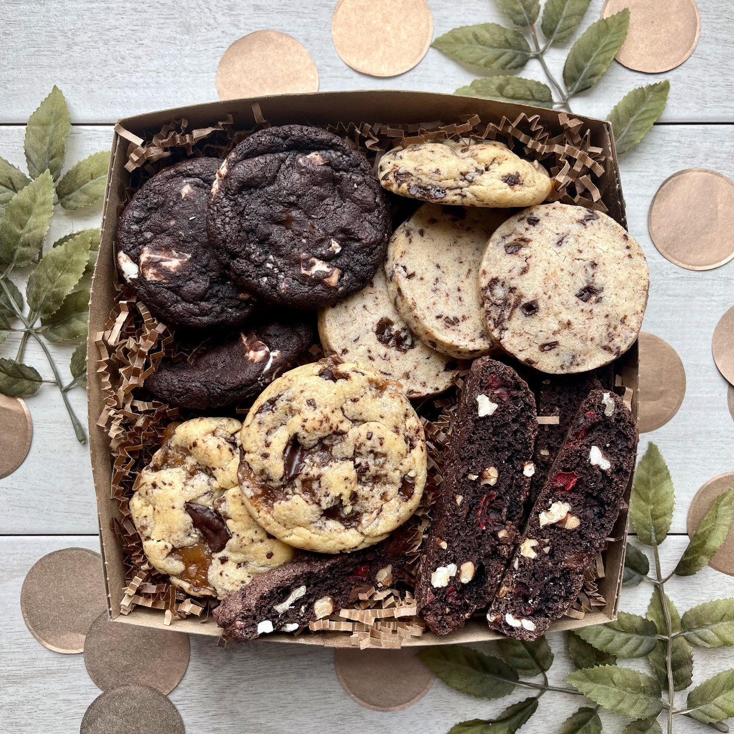 Chocolate cookie gift box with toffee chocolate cookies, double chocolate cookies, espresso shortbread, and chocolate biscotti.