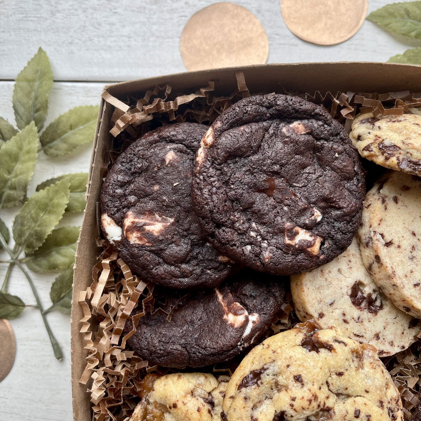 Chocolate cookie gift box with toffee chocolate cookies, double chocolate cookies, espresso shortbread, and chocolate biscotti.