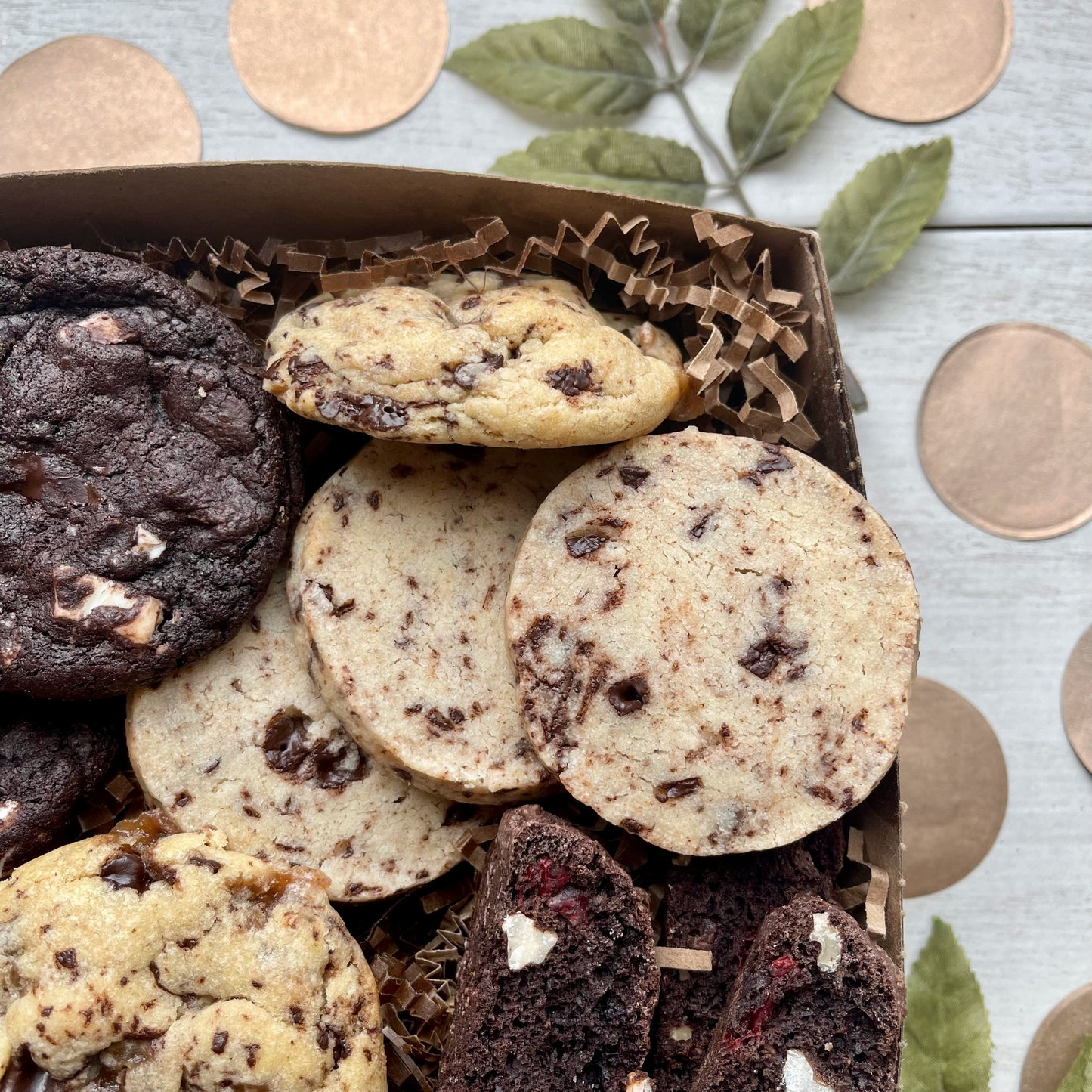 Chocolate cookie gift box with toffee chocolate cookies, double chocolate cookies, espresso shortbread, and chocolate biscotti.