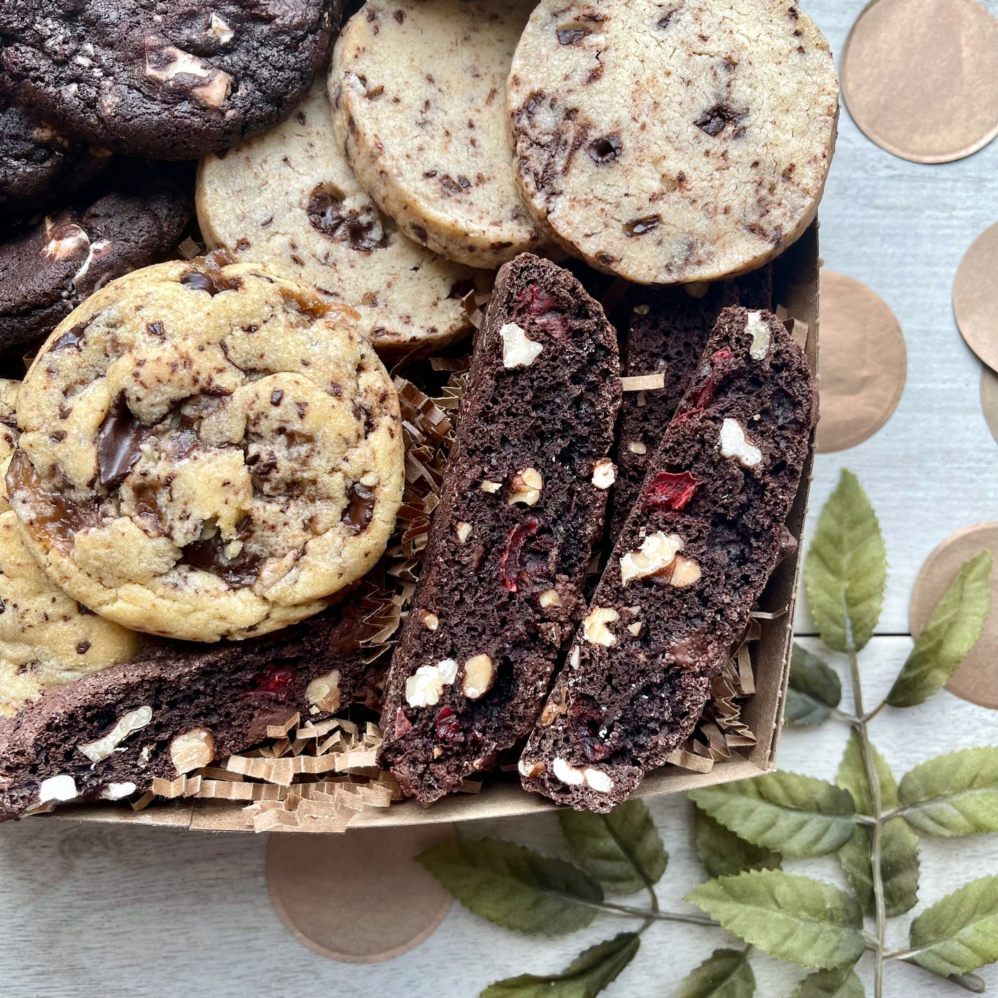 Chocolate cookie gift box with toffee chocolate cookies, double chocolate cookies, espresso shortbread, and chocolate biscotti.