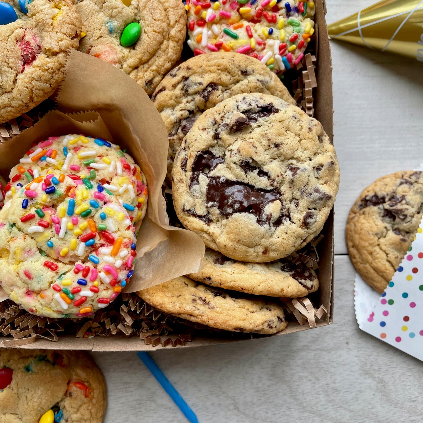 Birthday gift box with sprinkle cookies, m&m cookies, and chocolate chip cookies.