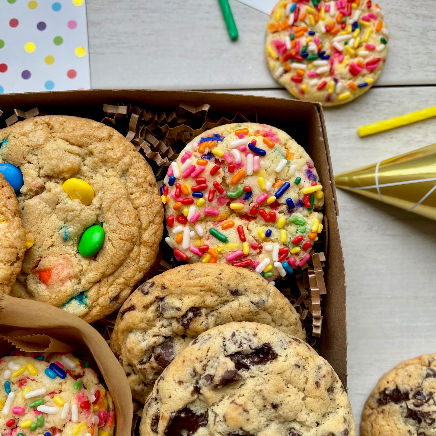 Birthday gift box with sprinkle cookies, m&m cookies, and chocolate chip cookies.