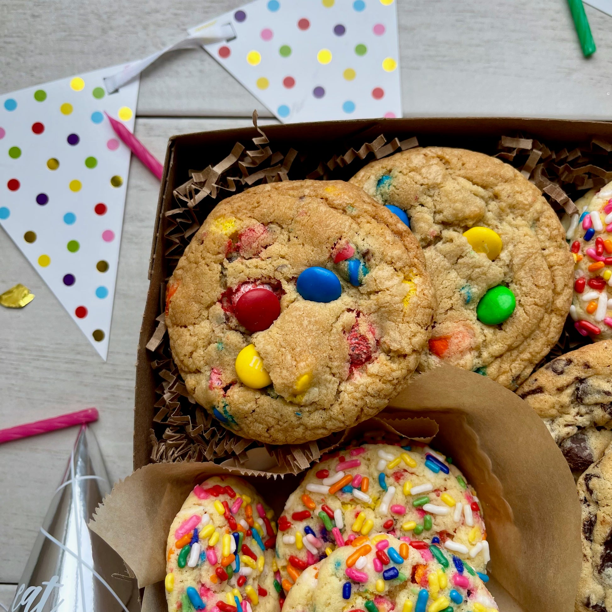 Birthday gift box with sprinkle cookies, m&m cookies, and chocolate chip cookies.