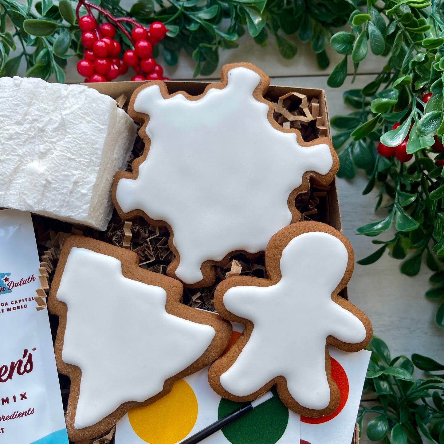 Gingerbread cookie decorating kit with handmade marshmallow, hot chocolate, and edible paint palettes.