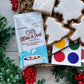 Gingerbread cookie decorating kit with handmade marshmallow, hot chocolate, and edible paint palettes.